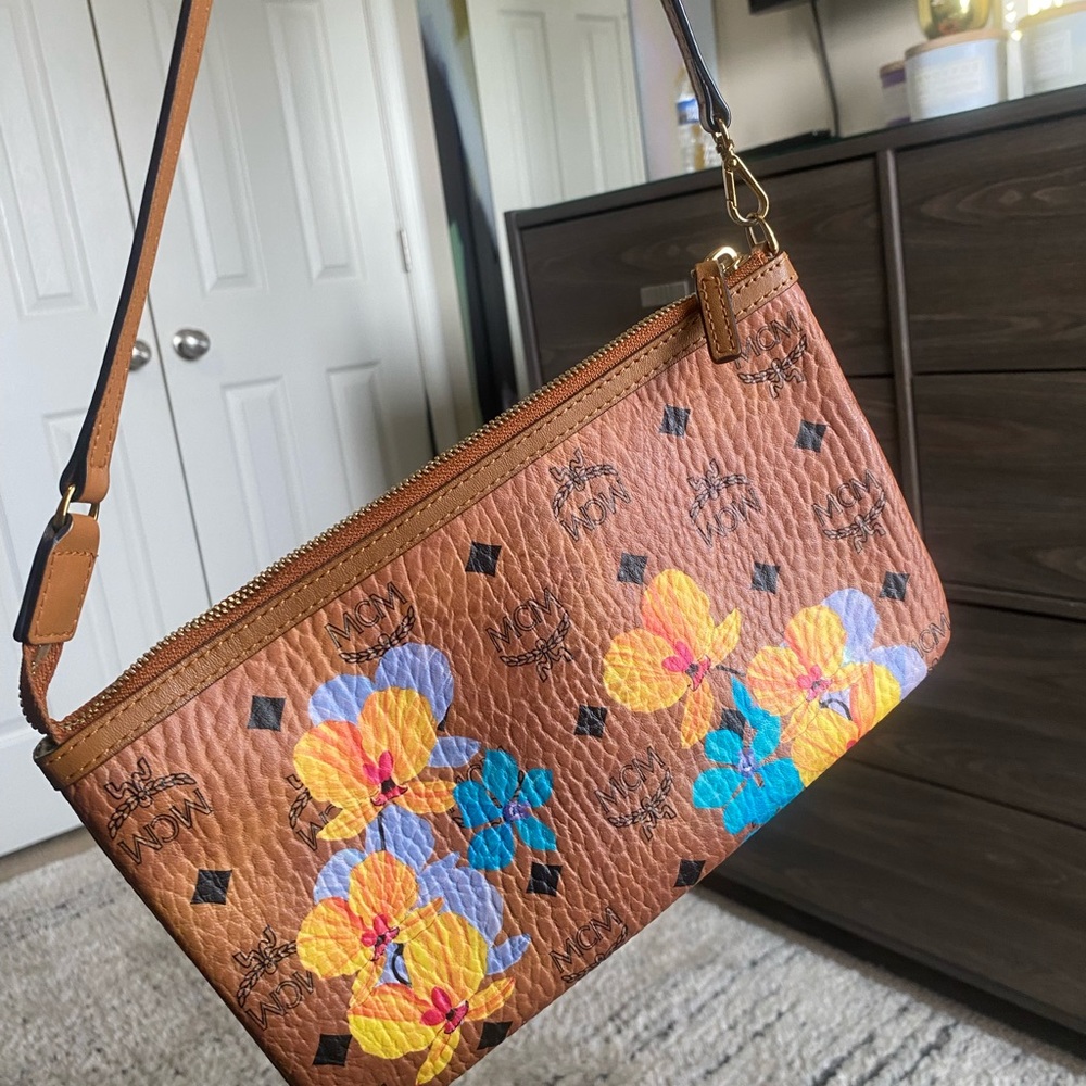 Limited edition MCM small purse has matching Tote sold separately